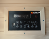 Control panel for SunWave Saunas with digital display and buttons on a wooden background